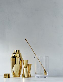 24-Karat Collection, $42–$128<br><br>This luxe set includes a cocktail shaker, jiggers, and mixing spoon, all of which are plated in 24-karat gold. It also includes a simple glass mixing glass.
