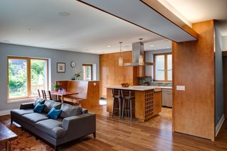 Flooring includes Teragren bamboo, cork in the kitchen, and porcelain at entry points. American Yellow Birch was used for the cabinets and trimming.<br><br>Photo by: Eric Hausman Photography