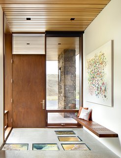A Custom, LED-Lit Slide Twists Through This Family-Friendly Vacation Home - Photo 1 of 11 - The Conine family’s Jackson Hole hideaway is completely wired.