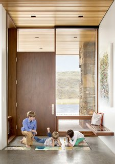 A Custom, LED-Lit Slide Twists Through This Family-Friendly Vacation Home - Photo 2 of 11 - Steve Conine, a software engineer, installed and programmed many of the details himself, like the Dell UltraSharp flat-screen panels inlaid into the entryway of the home.