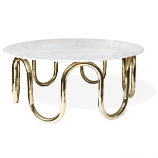Creativity and Constraint: A City Modern Preview - Photo 8 of 9 - Adler’s Scalintatella Cocktail Table was named for his favorite hotel in Capri. Carrera marble atop a hand polished brass base form a simple yet glamorous spot for drinks or magazines.