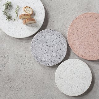 The Terrazzo Platter from Serax is a sophisticated kitchenware accent and can be used as a serving tray, a board for cheese and charcuterie, or even as a centerpiece on a dining room table.