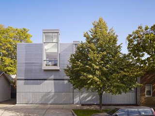 A Two-Story Addition Turned a Bachelor Pad Into a Comfortable Home For Two - Photo 1 of 6 -