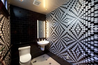 "Usage of the space to be wallpapered is also key," Sherman says. "If you are installing in a bathroom, you certainly don’t want to use anything water sensitive. And if you have kids or pets, you don’t want anything that can’t be cleaned easily. Once you have determined these aspects, you can swing any direction on color and pattern to suit your taste."