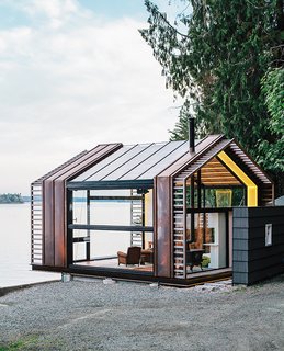 Standing-seam copper siding accentuates sections of the structure that provide shear support for the steel moment frame.