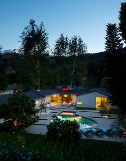 An existing pool at this Bel Air midcentury was made smaller and given a simpler shape, allowing for a larger deck area.