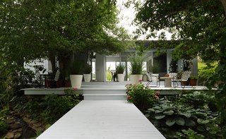 Set amid the greenery of Shore Walk, this 1964 beach house is a charming early work of post-and-beam construction by Harry Bates of Bates Masi Architects. The modern structure was once occupied by a member of the Rockefeller family.