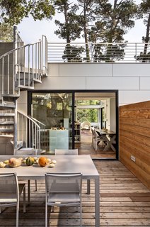 Take it Outside With These 11 Spring-Friendly Deck Spaces - Photo 7 of 11 - A small deck is a comfortable outdoor area for a house on a steep site in Carmel, California. The house is set on a forested hill, which means the backyard—though scenic—is too steep to enjoy. It’s also perpetually shady. Owner, architect Mary Schicketanz wanted somewhere she could soak in the sun, so she added a roof deck. "It’s really the only usable, large outdoor space I have," she says.