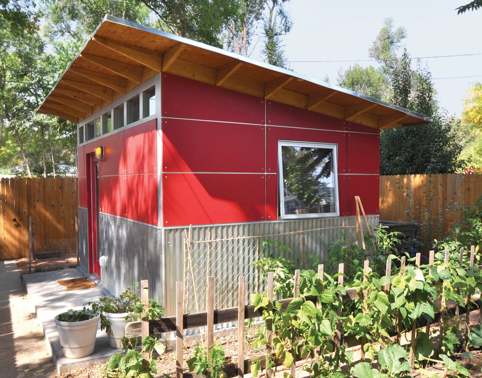 a prefab shed that provides refuge for work and play - dwell