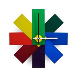The colorful Watch Me Wall Clock was designed with creative people in mind. Inspired by a fanned color swatch, the clock has a decidedly cheerful disposition.