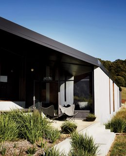 Windows and terraces were designed to frame specific vistas ranging from rural pastures to vineyards, olive groves, and the Hanging Rock outcrop. "The views are very controlled," Titania says.