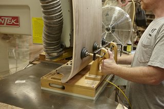 Even after 60 years, each piece is hand-assembled in the United States. That human touch makes sure each piece is thoughtfully put together, and that natural variations in the leather and wood are taken into account.