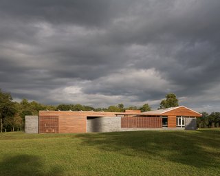 A Bold Home Creatively Combines Curves and Modern Lines - Photo 1 of 10 -