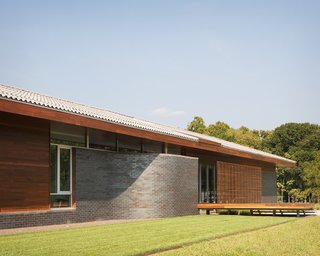 A Bold Home Creatively Combines Curves and Modern Lines - Photo 2 of 10 -
