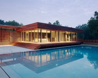 A Bold Home Creatively Combines Curves and Modern Lines - Photo 9 of 10 -