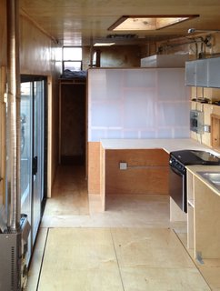 Learning as they went, they opted for an industrial look for plumbing and electric. "We knew we didn’t really have the skill to be fussy, so we just embraced that and went with it," Brian explains.