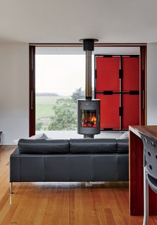 The fireplace, by Rais, can rotate in different directions for both indoor and outdoor use.