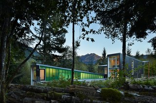 This Retreat in the Cascades is a Bold Take on the Modern Cabin - Photo 10 of 10 - "I wanted the buildings to be crisp, bold, and clean," Coleman said. Exterior vertical siding is made from locally sourced cedar stained in a "hazelnut" shade by Sikkens Cetol SRD.