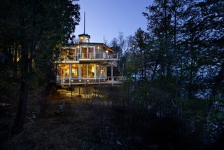 Built into the side of a bluff on almost two-acres in the secluded wooded community adjacent to Door Bluff Headlands County Park, this mid-century modern home was designed by Wisconsin Architectural Hall of Fame green pioneers Willis & Lillian Leenhouts.