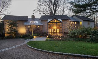 The ultimate retreat, this mid-century modern masterpiece features a main house, separate guest house and three-car garage. Luxurious mahogany finishes can be found throughout the interior of the home in addition to dramatic main rooms and a gourmet kitchen built by Boffi in Italy.