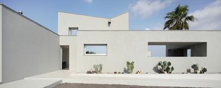A Home That Dramatically Replicates a Starry Sky in Its Living Room - Photo 9 of 9 - The architect calls the house a "contemporary interpretation of the traditional Hyblaean villa." Both the promenade and groves of native olive trees are typical features of that style.