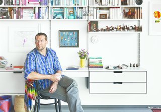 Rob Fissmer of the furniture company Vitsœ lives with his wife in a restored, A. Quincy Jones-designed house in Crestwood Hills.