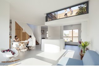 A Clever Sunken Roof Fills a London Terrace House with Light - Photo 1 of 7 -