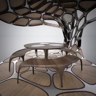 Volu Dining Pavilion by Zaha Hadid and Patrik Schumacher One of the first unveiled designs features curvy wood dining furniture nestled inside a metal structure in the shape of an oversized open clamshell. Backlit by purple-toned LEDs, Volu embodies the sci-fi effect typical of Hadid’s work. Each Volu Dining Pavilion, to be be produced in an edition of 24, will go for $480,000.