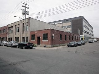 The old shop, which they purchased in 2009, is located in Mile Ex, an up-and-coming neighborhood in Montreal. The renovation required a great deal of permitting and rezoning, and during the long wait they "let the pot stew with their ideas," according to Chabauty. They decided to keep the facade simple to preserve its character.
