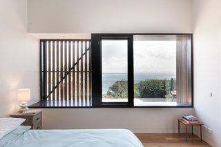 External shutters and screens allow the homeowners to manage the sunlight and cross ventilation in certain rooms. Manos Mavridis, also of OLA Studio, explains, "There was a preference for the screens to be manually operated to minimize ongoing maintenance costs and encourage user engagement with their environment."