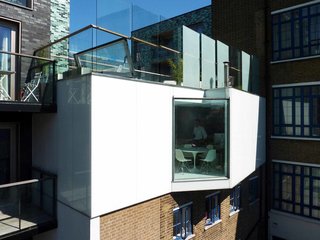 A Tiny Live/Work Addition Crowns a Historic London House - Photo 1 of 7 -