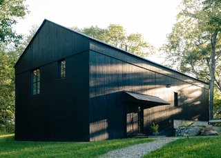 A Passive House and "Sauna Tower" Join a 19th-Century Barn in the Hudson Valley - Photo 12 of 13 - "Who better than the farmer and the farmer's family to know how most effectively and easily to find efficiency?" says architect Alan Barlis. Regional architecture inspired the barn-life structure of the house, an open volume that aides in efficient heating and cooling of the space.