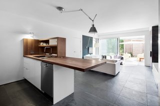 A Monochromatic Renovation for a 19th-Century Montreal Home - Photo 4 of 7 -