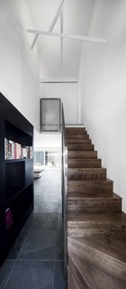 A Monochromatic Renovation for a 19th-Century Montreal Home - Photo 6 of 7 -