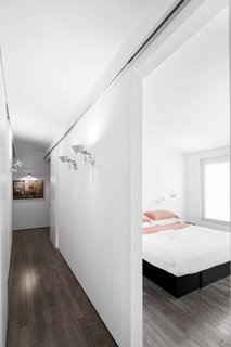 A Monochromatic Renovation for a 19th-Century Montreal Home - Photo 7 of 7 -