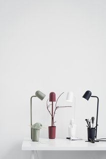 An unassuming little helper is how young Danish designer Mads Sætter-Lassen modestly describes his desk lamp, Buddy, designed for Northern Lighting. The multifunctional design includes a holder to keep pens, keys, and other small objects that are easily lost. The flexible shade, available in five matte colors, can be rotated in any direction.