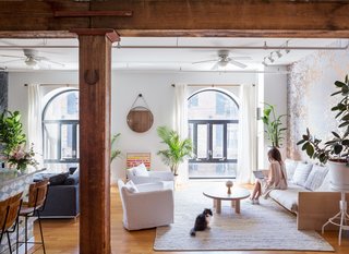 Exposed structural beams are a historic nod to the loft’s previous life as a 19th-century warehouse and shipping dock. For the Copes, inspiration for creative projects never draws far from home; they named Calico after their cat, Irie.