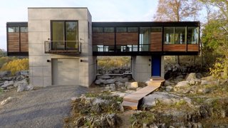 Strait envisioned a house that was molded into its surroundings and that disrupted the landscape as little as possible. Similar to her work, the structure delicately touches down in an organic way. When they were developing the plans on-site, they were successful at moving only the bare minimum of existing boulders.