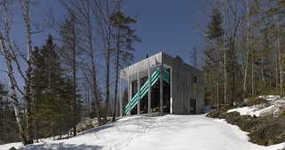 Dozens of Levels Give a Quebec Home Stadium-Sized Views of the Forest - Photo 1 of 7 -