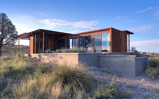 The concrete plinth supports the planters and deck, while concealing a foundation of pylons.