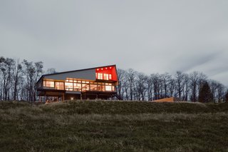 "For the structure, Mapos devised a hybrid system of concrete, steel, and Structural Insulated Panels (SIPs)," co-principal Caleb Mulvena says. "Each was strategically utilized to create a lightweight, rigid, and highly energy-efficient shell." Fiber cement-board cladding and a steel standing-seam roof act as the structure’s envelope.