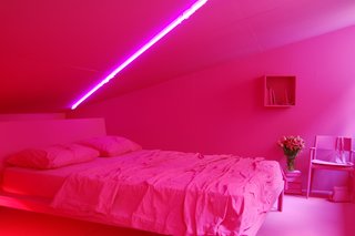 Here, Lissoni's new Neve chair is shown inside a pink bedroom configuration.