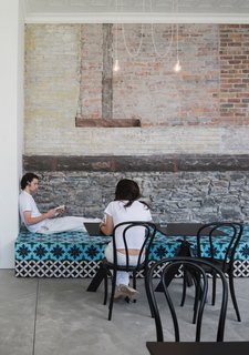 A Historic Masonry Stove Becomes the Hidden Gem of a New Cafe - Photo 1 of 8 -