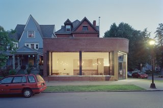 A Historic Masonry Stove Becomes the Hidden Gem of a New Cafe - Photo 2 of 8 -
