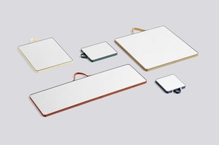 Inga Sempé designed the ribbon-wrapped Ruban mirrors for HAY. Move them from room to room, or keep them fixed on the wall to save floor place.