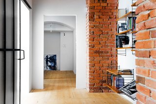 All This Warehouse Stores Nowadays Is Impeccably Cool Furniture - Photo 2 of 4 - In addition to reconstructing an open living room, the designers had to subdivide four smaller spaces to create privacy in the expansive warehouse. 