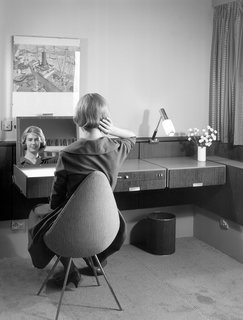 Jaime Hayon is Given the Keys to an Iconic Copenhagen Hotel - Photo 3 of 9 - Arne Jacobsen designed nearly every element of the hotel, including the built-ins, textiles, and accessories. In addition to furnishing the rooms with existing pieces from his portfolio, Jacobsen created new pieces for the hotel, like the Drop chair shown in this archival photo.