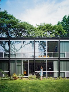 Residents are allowed a small swatch of land to plant gardens. "A lot of credit is due to the landscape architect," says Barlow, and "Mies's floor-to-ceiling windows make the spaces feel open, while at the same time the canopy of trees makes you feel protected."