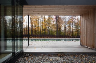 This Family Never Has to Fight About Where Their Next Trip Will Be - Photo 2 of 4 - A covered breezeway frames a view of the pool. The residents use the home during summer and winter equally.