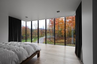 This Family Never Has to Fight About Where Their Next Trip Will Be - Photo 4 of 4 - The second floor is dedicated to the son, whose bedroom commands an impressive view of Mount Sutton in the distance. 